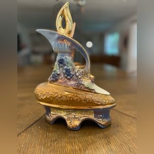 1977 empty Jim Beam liquor bottle